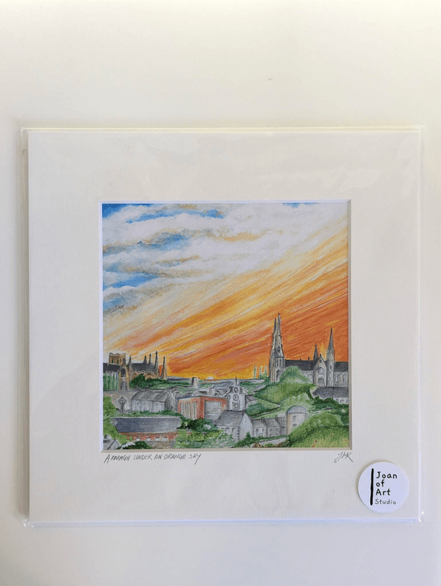 Armagh under an orange sky - Art Print by Joan McKeever
